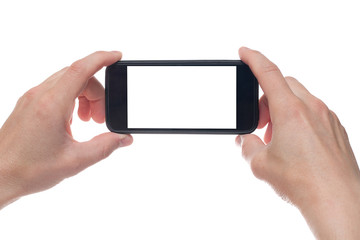 Hand holding black Smartphone with blank screen on white backgroun.