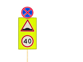 Speed Bump and 40 Speed limit traffic signs on the yellow shield isolated on the blue background. Red triangular and round warning road signs warning of a bumpy road ahead and speed limitations.