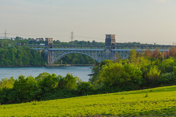 View of the Britania Bridge across the Menai Straits in Wales. The bridge divides Anglesey from the Wales mainland.  The bridge opened in 1850. 