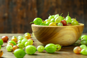 gooseberry in a wooden plate