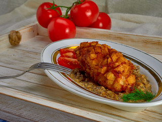 Delicious fried Patty of chicken meat, Pozharskaya.With creamy mushroom sauce.Fresh vegetable salad.Fried toast.