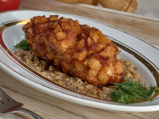 Delicious fried Patty of chicken meat, Pozharskaya.With creamy mushroom sauce.Fresh vegetable salad.Fried toast.