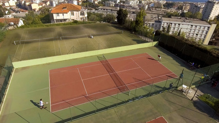 Rich people playing tennis at luxury court, leisure activities, sport weekend