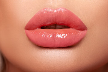  Sexy plump Lips Close-up. Lip Gloss. Beautiful  Perfect Makeup. Beautiful lips. Beauty. Cosmetic...