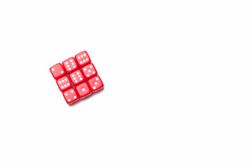 Nine red dice frorm a square on a white background