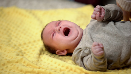 Helpless newborn crying, infant constipation problem, baby healthcare, colic