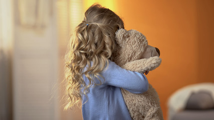 Offended girl hiding from camera, impact of parental quarrels on child, problem