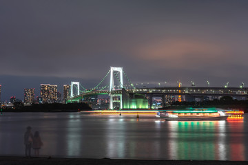 Fototapeta na wymiar Beautiful night view of Odaiba, Tokyo Tower and Rainbow Bridge in Tokyo, Japan