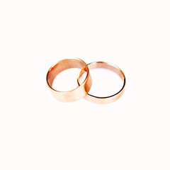 wedding rings. jewelry white and yellow gold. wedding ring on a white background.