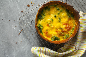 Homemade pie Quiche lorraine with salmon, cheese and spinach. Flat lay