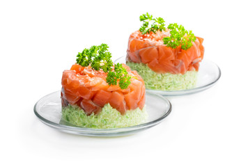 Salmon tartare with avocado isolated on white