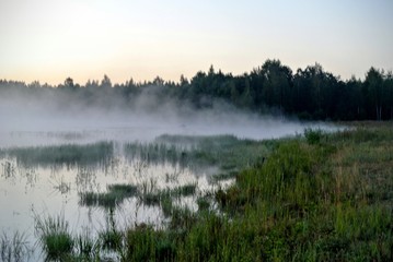 Fototapeta na wymiar lake, water, landscape, fog, nature, sky, morning, mist, sunrise, autumn, forest, trees, reflection, blue, tree, grass, sunset, clouds, tranquil, swamp, panorama, dawn, calm, outdoors