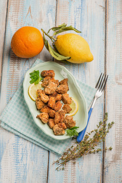 fried baked salmon with lemon and thymus
