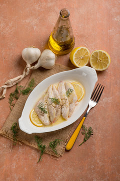 red mullet fillet with lemon sauce and garlic