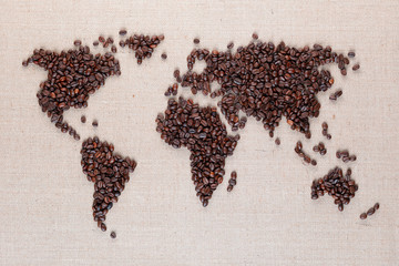 World map from coffee beans on linen canvas