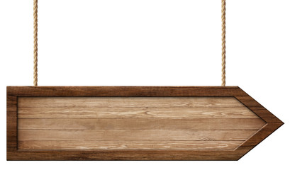 Simple wooden arrow signpost made of natural wood and with dark frame hanging on ropes