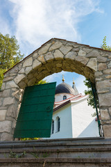Fototapeta na wymiar Gate of the Trinity Church, Russia, Polenovo
