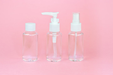 Beauty cosmetics glassbottle; branding mock up; front view on pastel pink background. Package for essential oil.