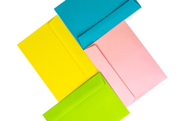 Different colored envelopes on the table. Multi colored envelopes and letters as a background
