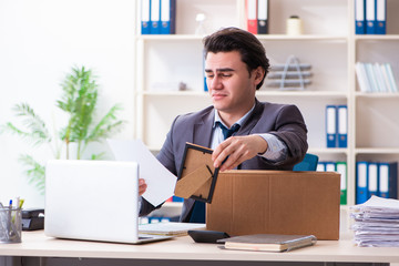 Young male employee being fired from his work