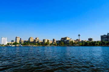 Fototapeta premium Residential and office buildings of the Cairo city. View from Nile river