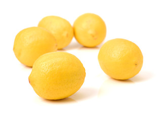 Ripe lemons on white background