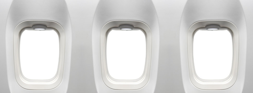 Airplane windows with clipping path in windows for replact you flight ad design placed on blank white airplane windows