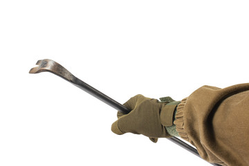 Soldier arm holding metal crowbar.