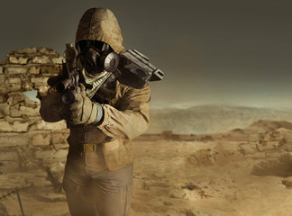 Desert post-apocalyptic soldier aiming standing with rifle.
