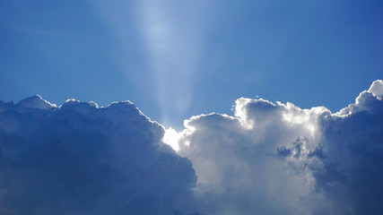 clouds cover the sun and light at the edge of the clouds creates a silver effect