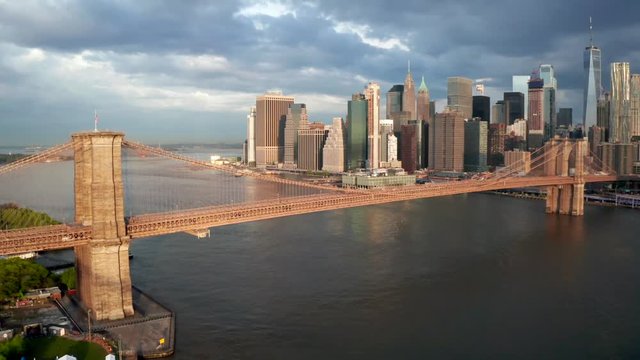 Famous Skyline of downtown New York, Brooklin Bridge and Manhattan island at the early morning sun light in New York City, USA.