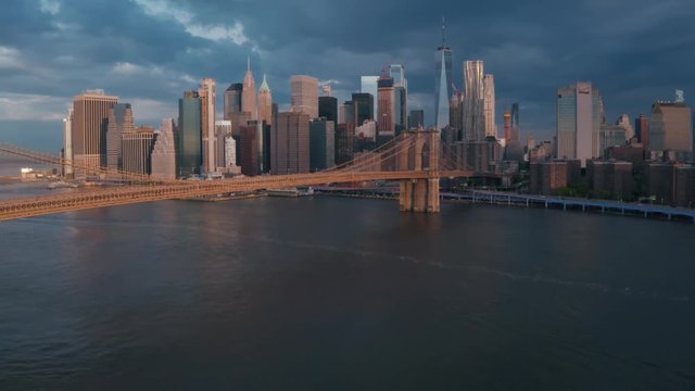 Famous Skyline of downtown New York, Brooklin Bridge and Manhattan island at the early morning sun light in New York City, USA.