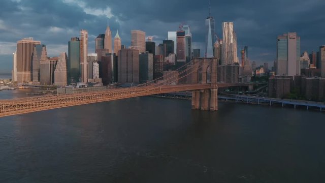 Famous Skyline of downtown New York, Brooklin Bridge and Manhattan island at the early morning sun light in New York City, USA.