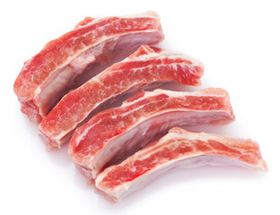 Raw pork ribs on white background
