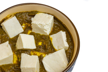 Palak Paneer made up of spinach and cottage cheese.