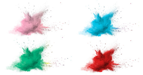 Freeze motion of colorful color powder exploding on white background.  Paint Holi.