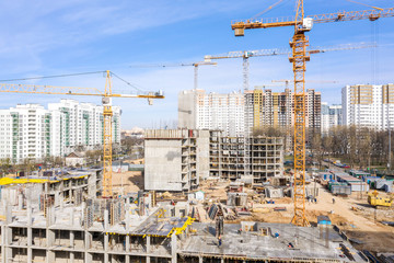 urban construction site with tower cranes. aerial view