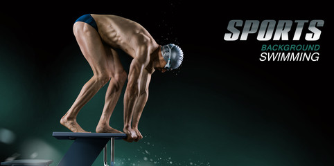 Swimming pool. Muscular swimmer ready to jump.	