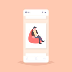businessman freelancer sitting at armchair business man using tablet freelance co-working concept male cartoon character flat full length smartphone screen mobile app