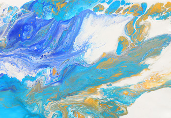 Abstract marbleized effect background. Blue and white creative colors. Beautiful paint with the addition of gold
