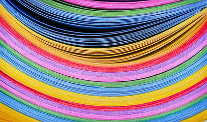 Texture layers of colorful multicolored paper  in line curve patterns background