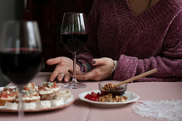 A gourmet lunch for two: a plate of dried cranberries and walnuts, a small bowl of honey