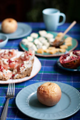 A nutritious and tasty breakfast for two: baked apples, baguette slices with smoky salmon 