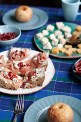 A nutritious and tasty breakfast for two: baked apples, baguette slices with smoky salmon 