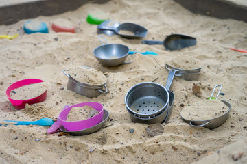 Sand tub and play in the park to enhance the development of young children. Child development concept