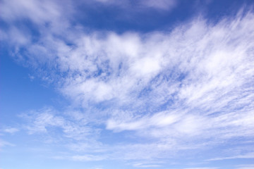 Clouds in motion in a blue sky