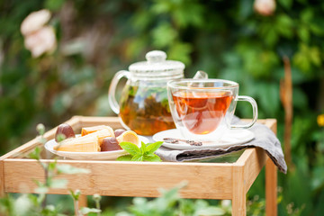 Cup of tea  in a garden