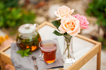 Cup of tea  in a garden