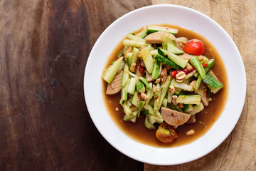 Spicy cucumber salad with steamed pork sausage, Thai food