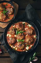 Meatballs with sauce on skillet